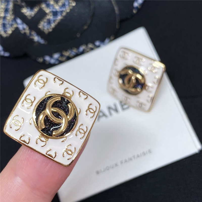 Ch**el white enamel Ch**el stud earrings