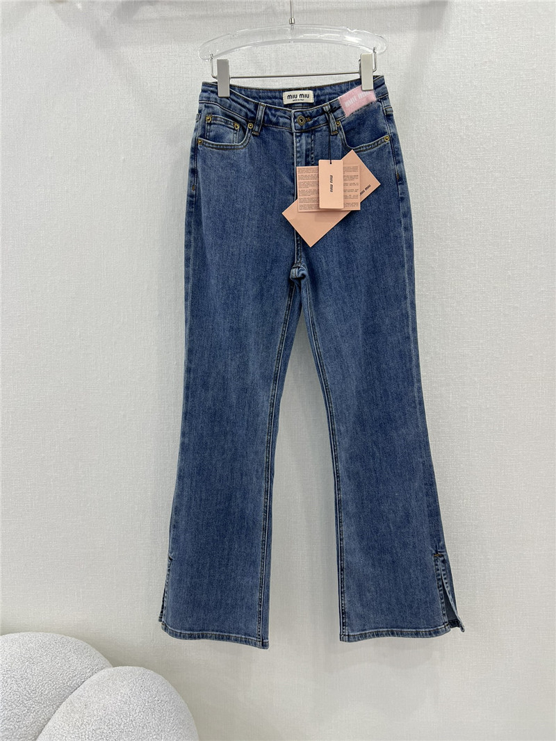 M1um1u waistband letter patch logo embellished jeans