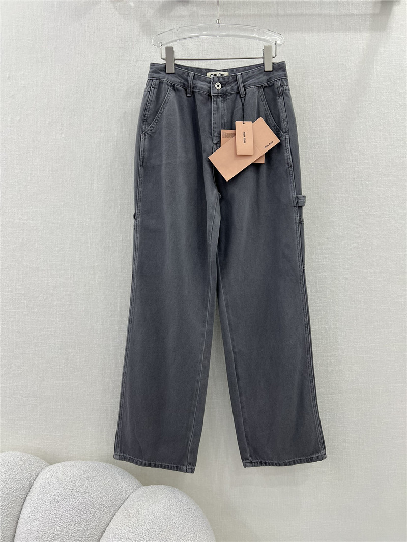 M1um1u waistband letter patch logo embellished jeans