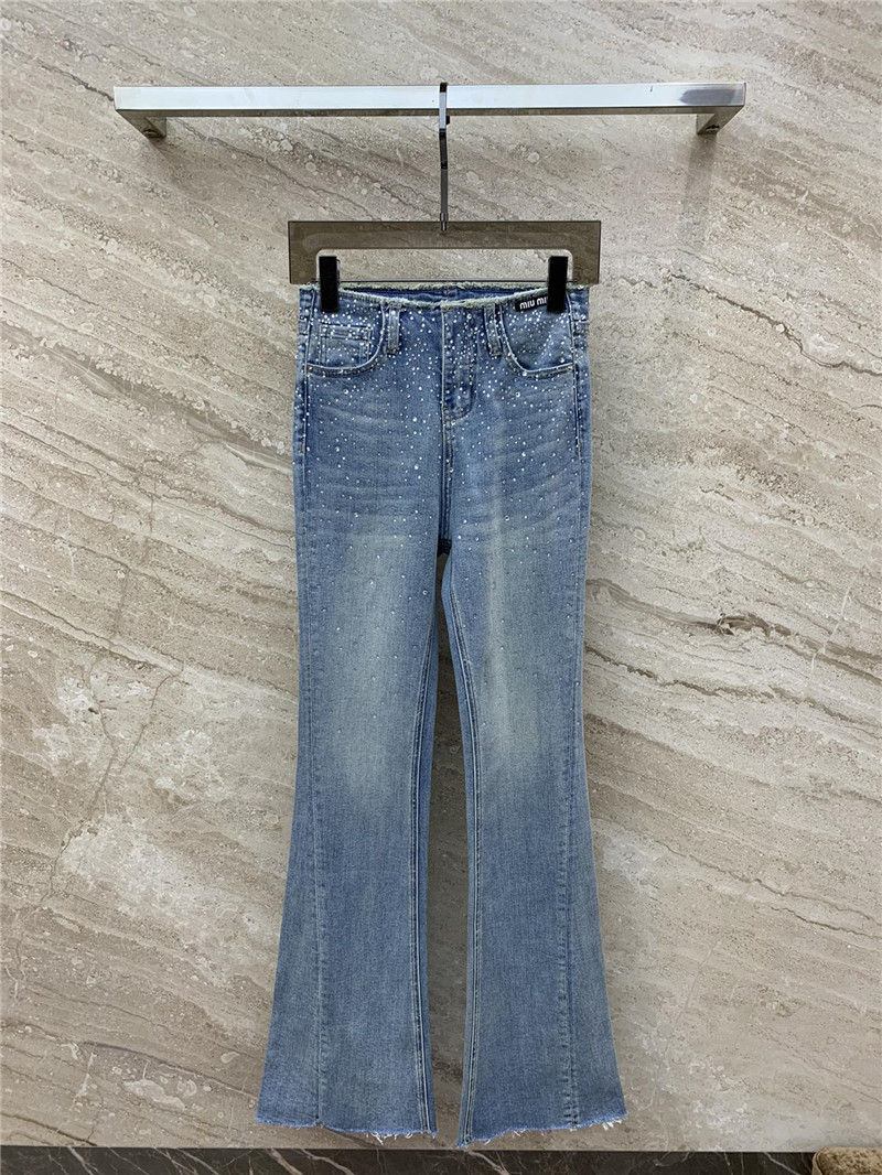 M1um1u micro logo embellished bootcut jeans