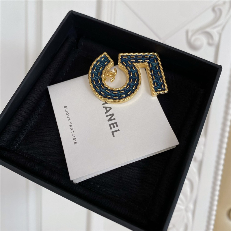 Ch**el denim 5 word double c brooch