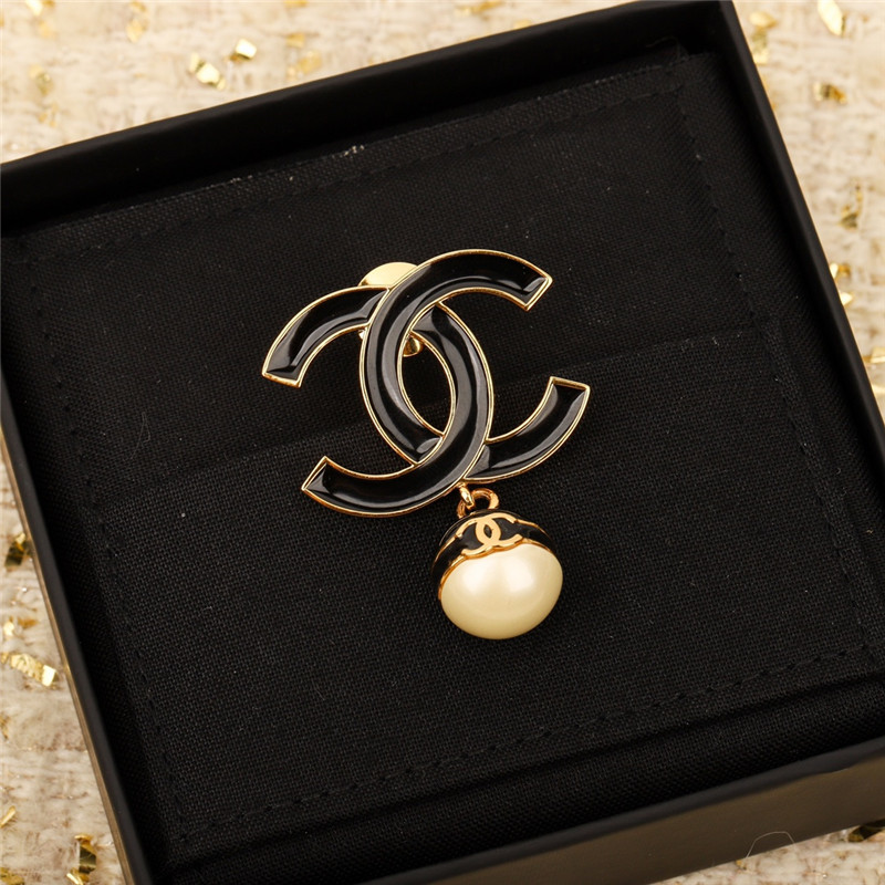 Ch**el black enamel hanging pearl brooch