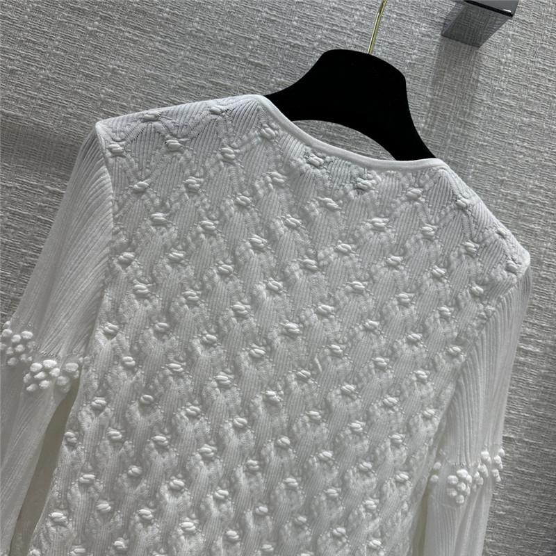 Ch**el hook fastening knitted cardigan in white