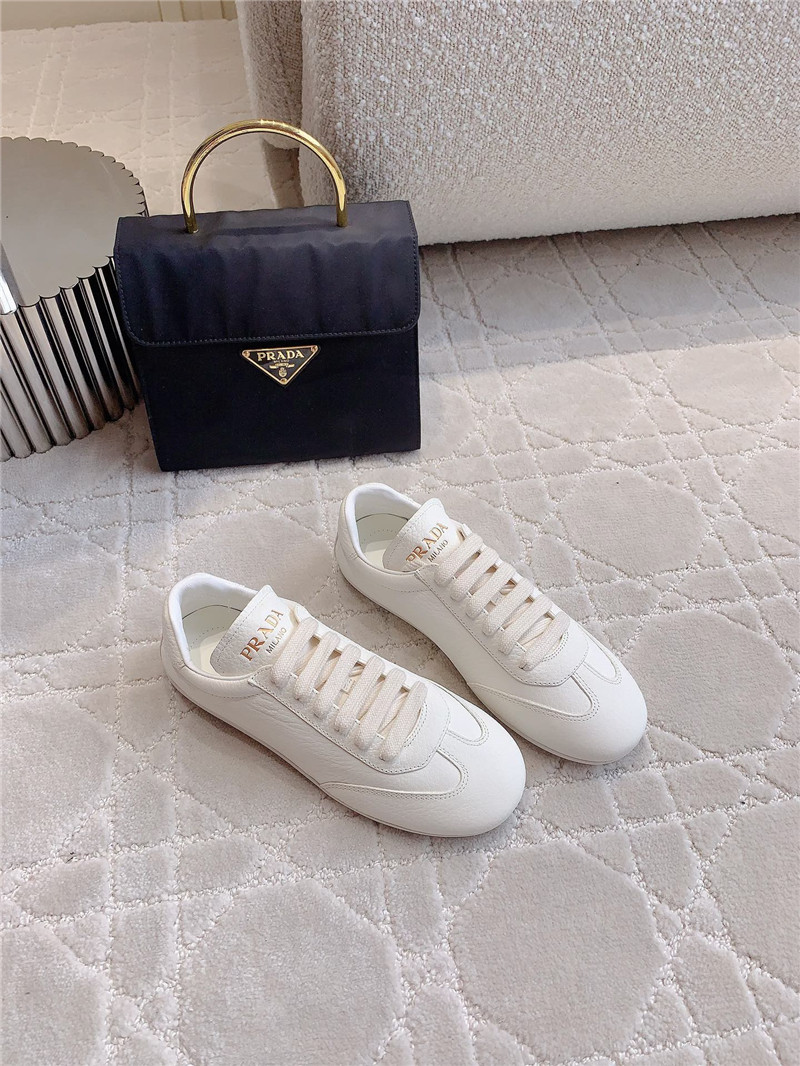 Pra*a triangle logo sneakers