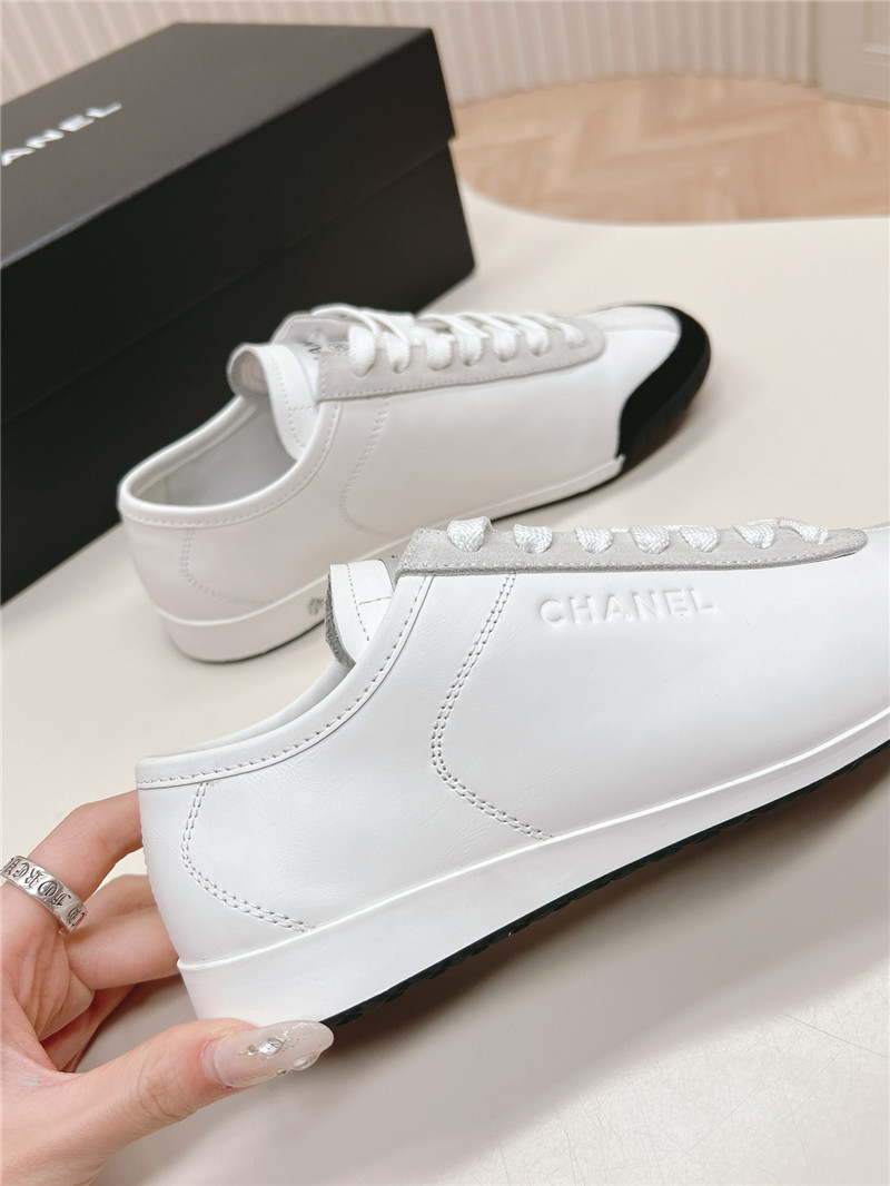 Ch**el white low top sneakers