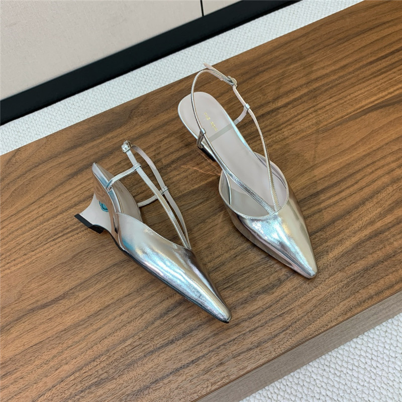 The R0w silver pointed toe slingback pumps