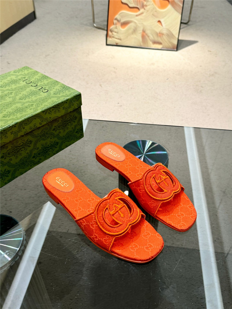 Gvc*1 interlocking g slide sandal in orange gg canvas