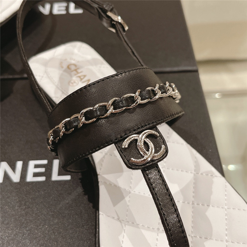 Ch**el quilted t-strap chain flat sandals black and white