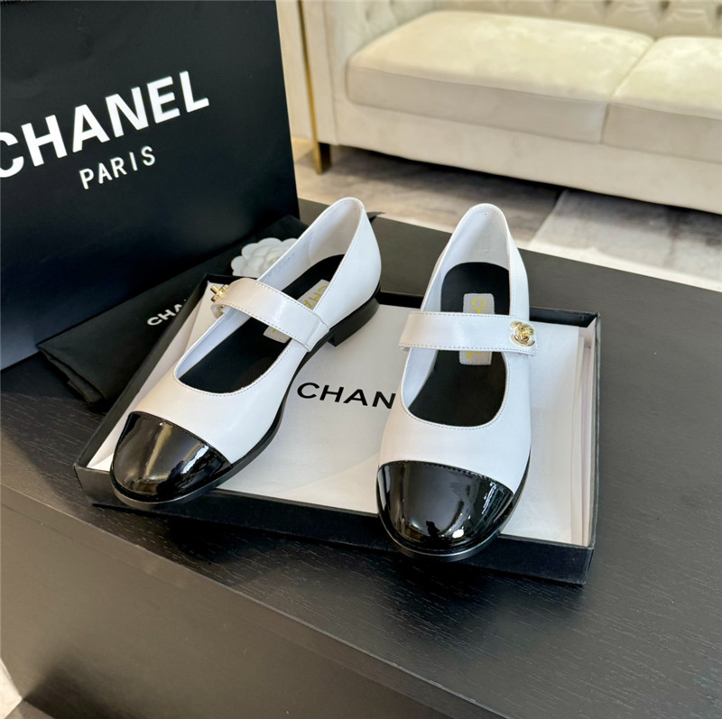 Ch**el gold interlock mary janes in white and black calfskin