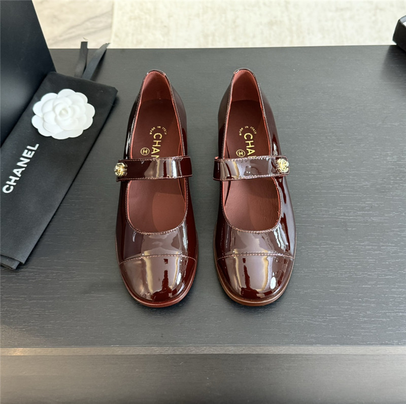 Ch**el gold interlock mary janes in burgundy patent calfskin