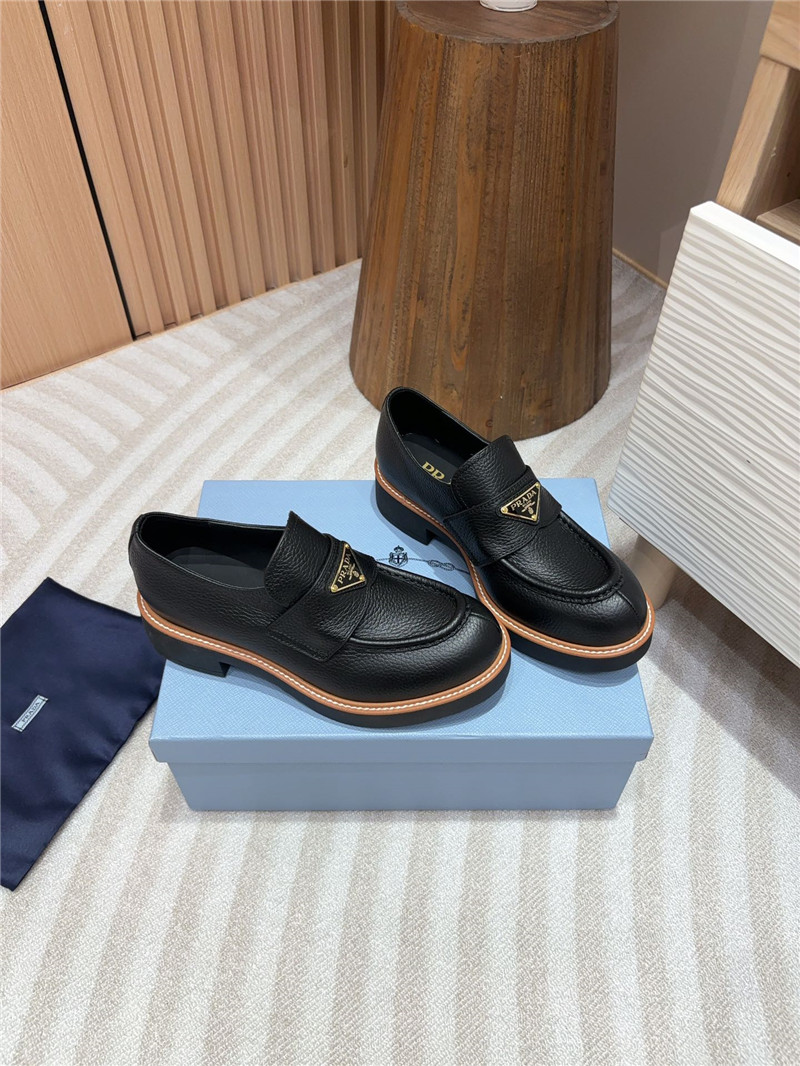 Pra*a black double chocolate leather loafers