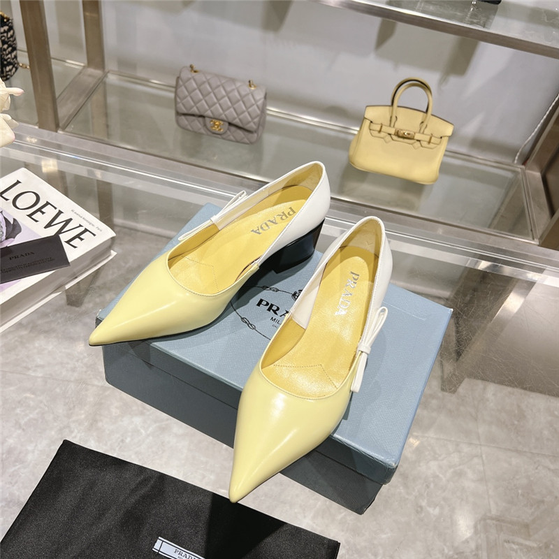 Pra*a chunky pointed pumps in yellow and white calfskin