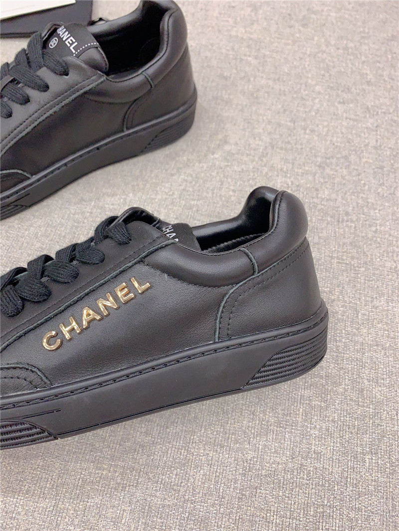 Ch**el black leather lace-up trainers