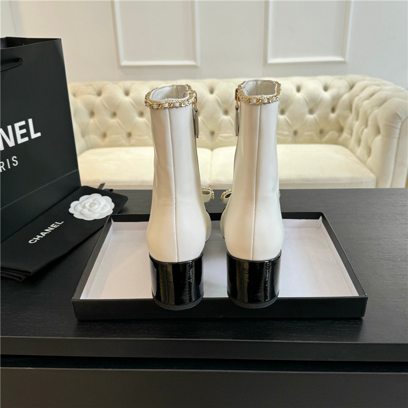 Ch**el white calfskin bow patent leather ankle boots