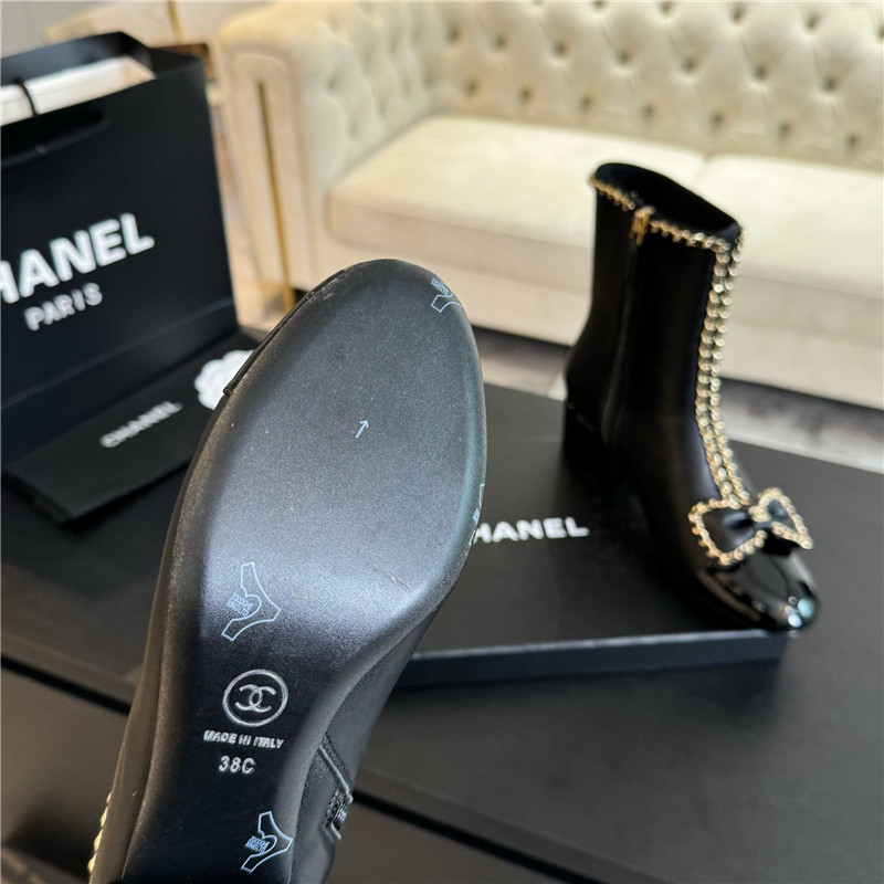 Ch**el black calfskin bow patent leather ankle boots