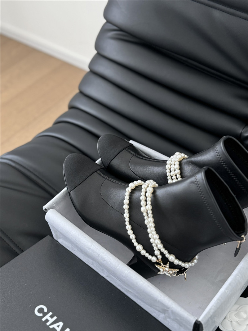 Ch**el black calfskin pearl ankle boots