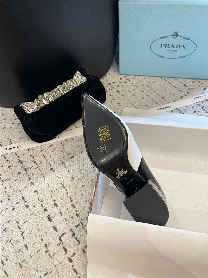Pra*a bow black/white brushed leather pumps