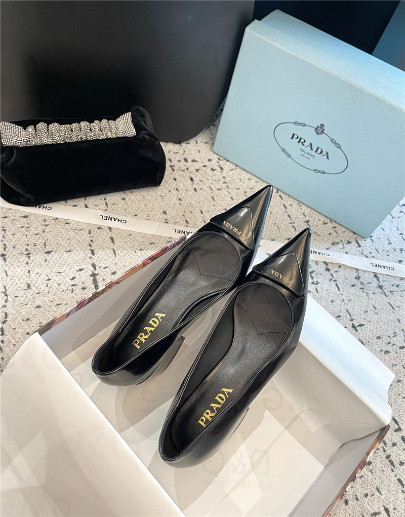 Pra*a triangle logo black brushed leather pumps
