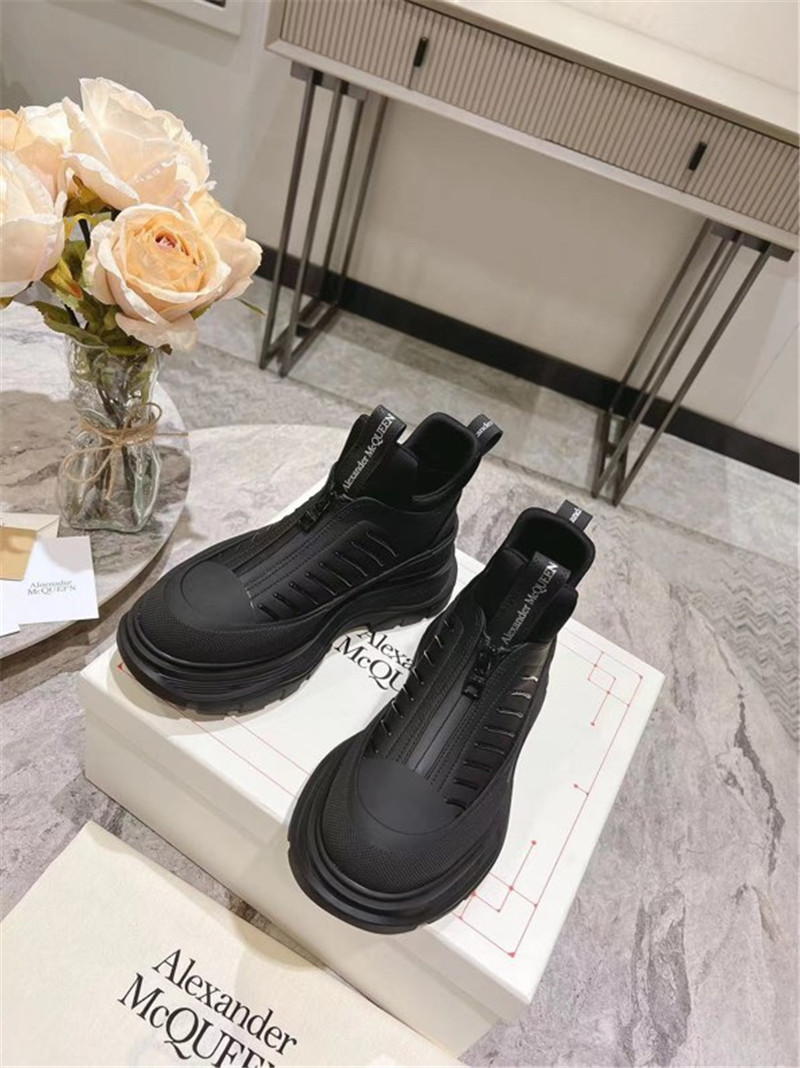 a1exa*der Mcqv*en black zip-up low top sneakers