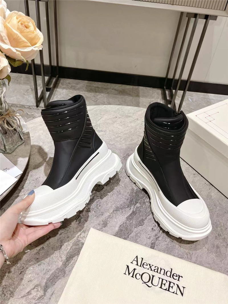 a1exa*der Mcqv*en tread slick high top sneakers