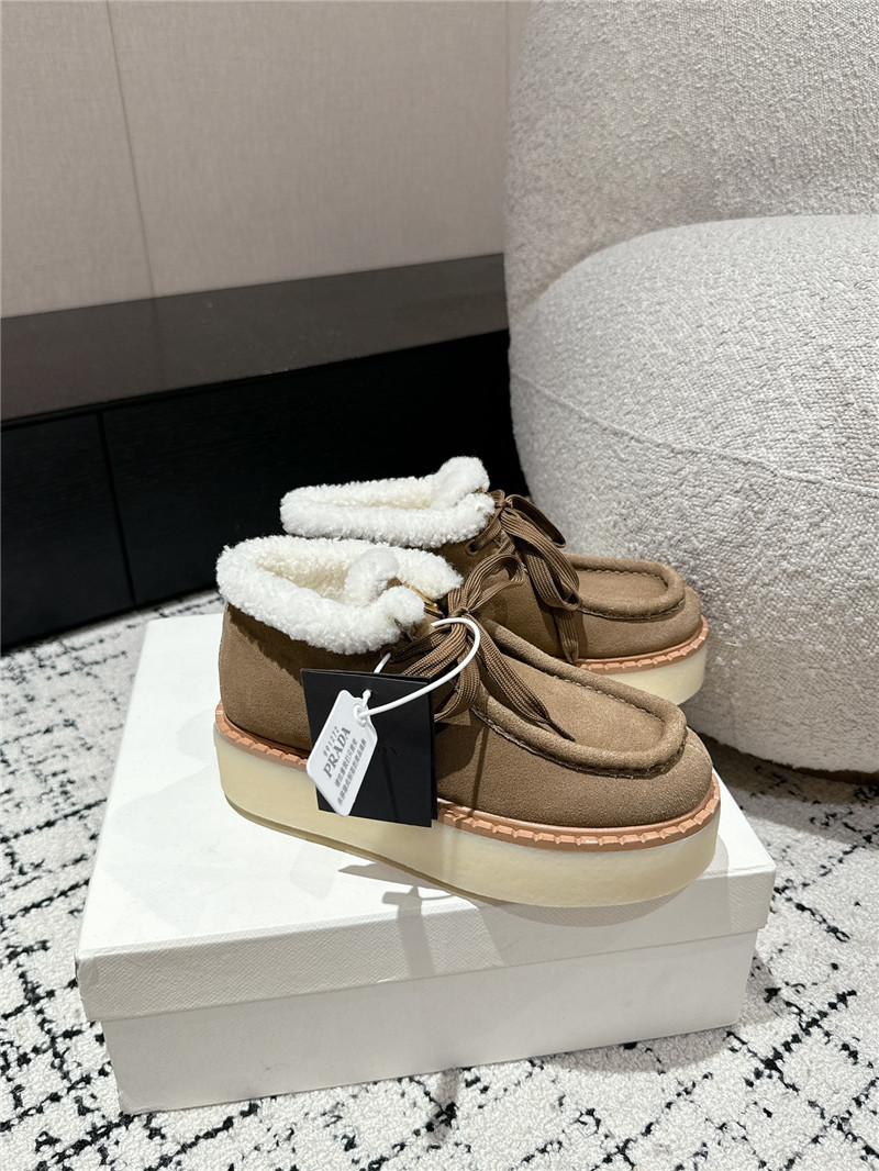Pra*a beige suede shearling platform ankle boots