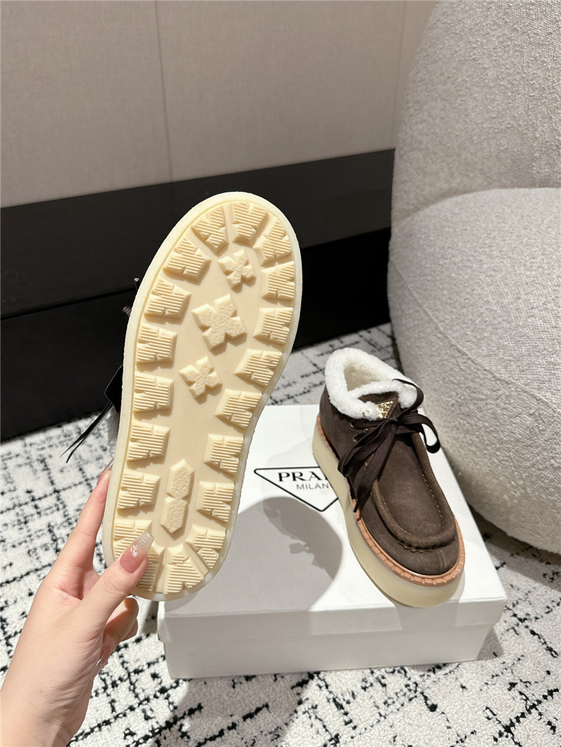 Pra*a brown suede shearling platform ankle boots