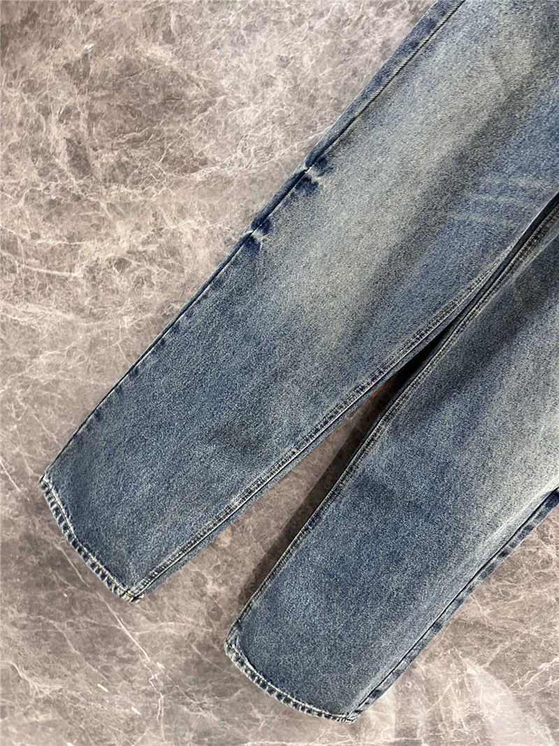 Pra*a triangle logo denim trousers