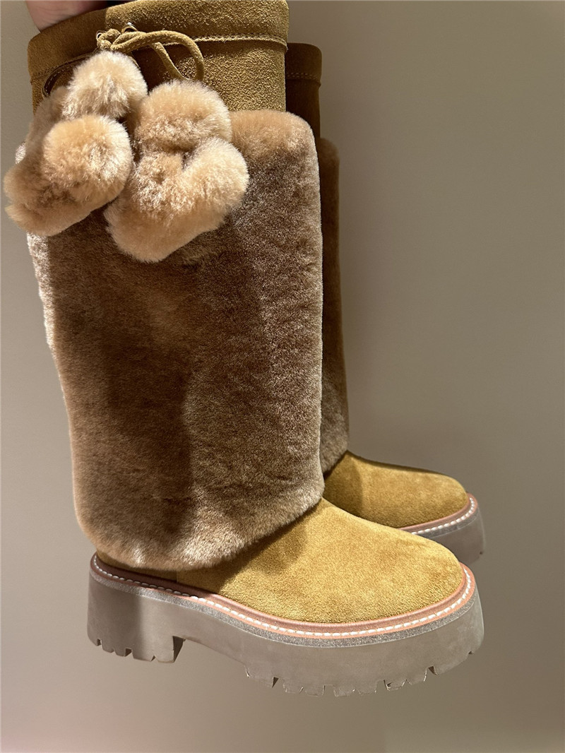 Ce1i*e bulky high boot with triomphe tassels