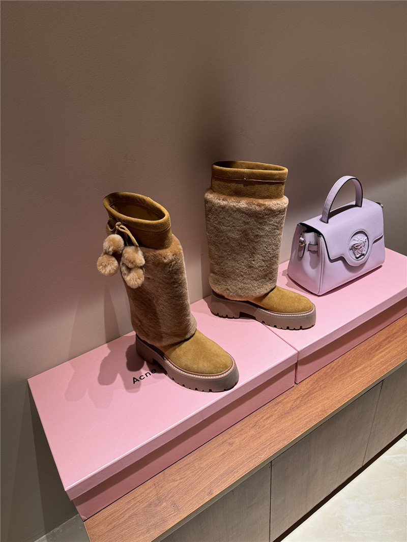 Ce1i*e bulky high boot with triomphe tassels