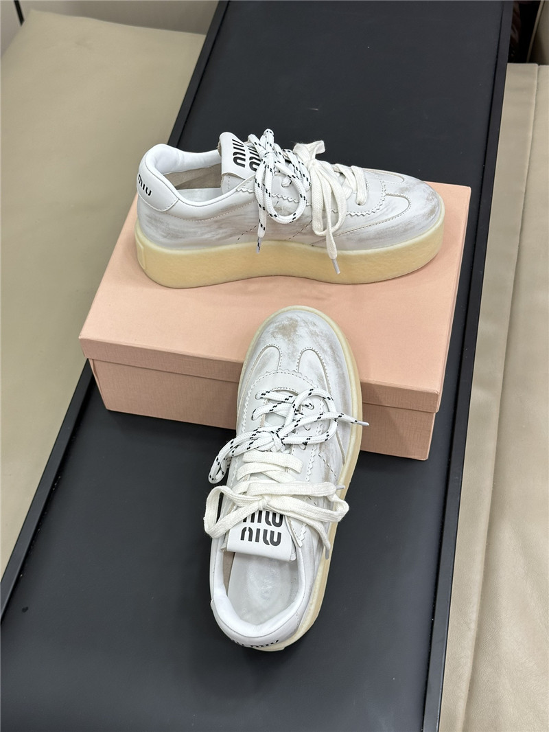 Miu Miu Bleached Leather Low Top Sneakers