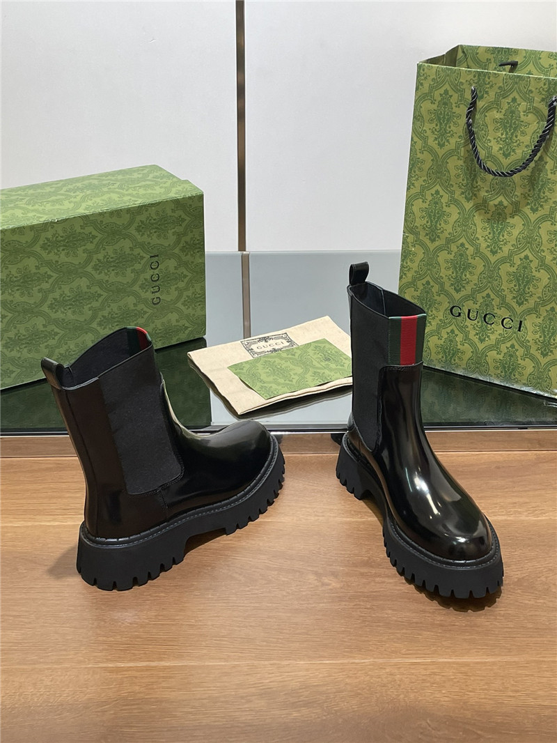 Gvc*1 women’s black patent leather boot with web