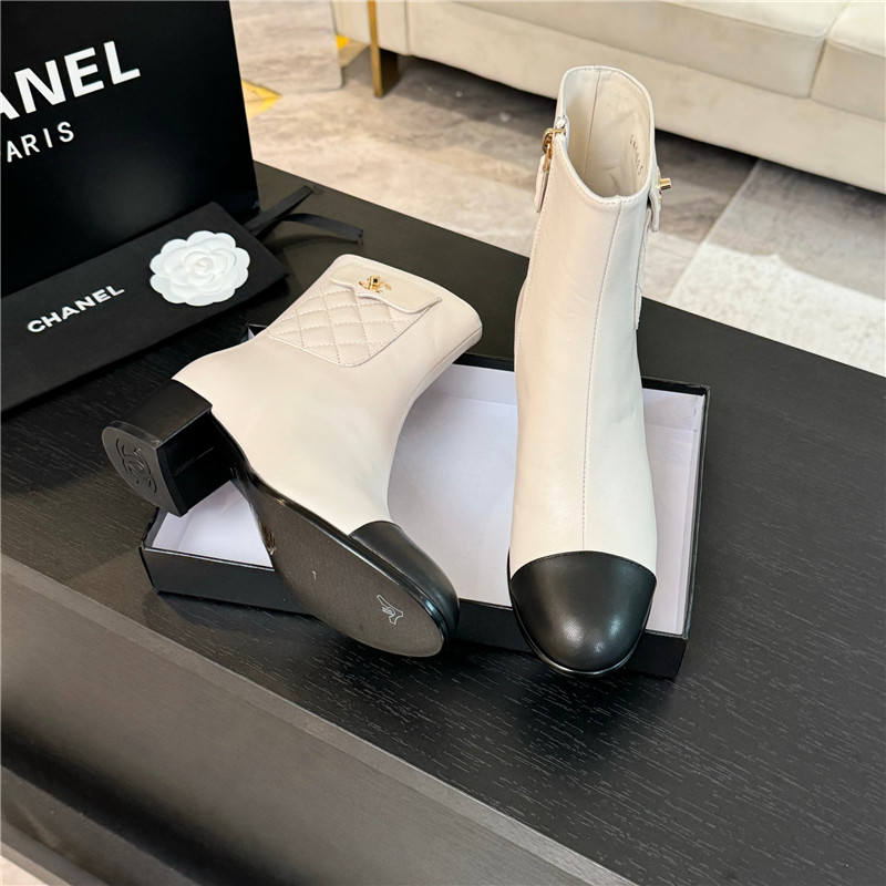 Ch**el calfskin cap toe ankle boots in white