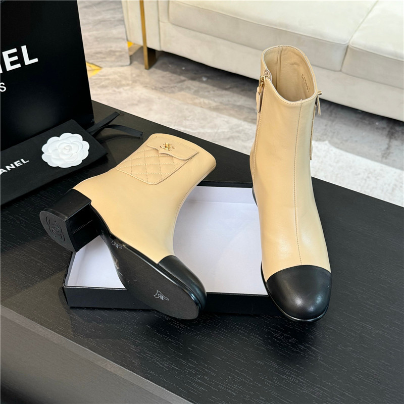 Ch**el brown calfskin cap toe ankle boots
