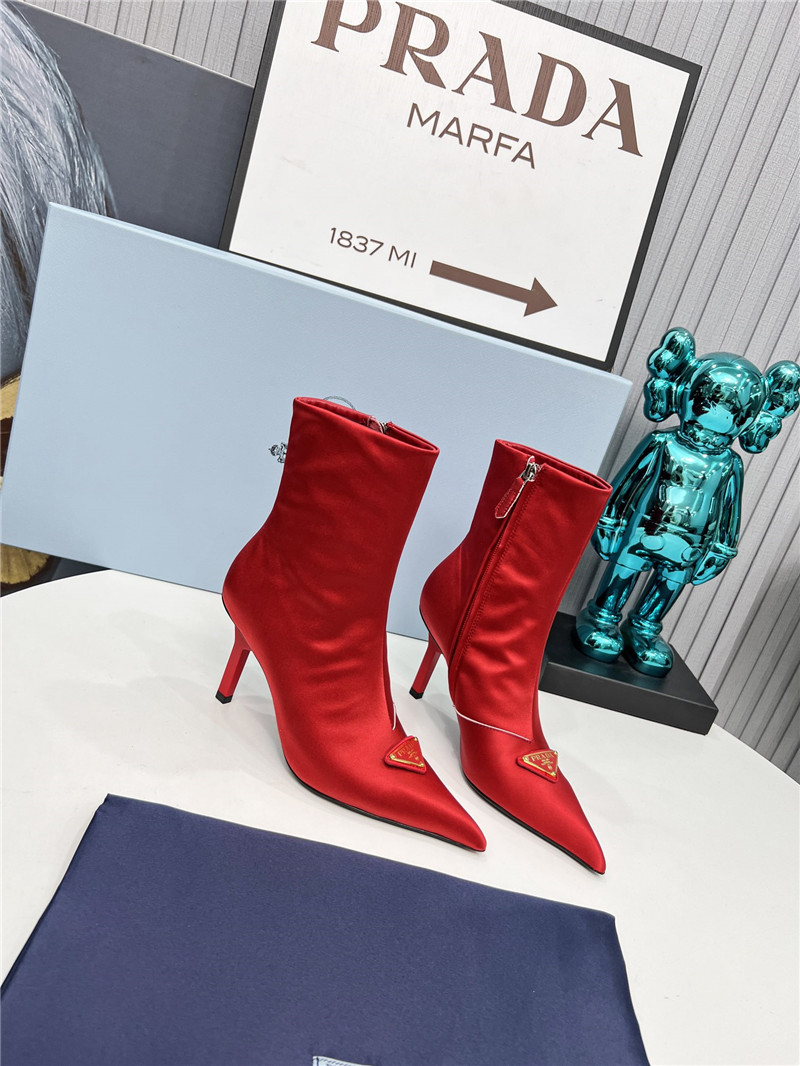 Pra*a red heeled ankle boots