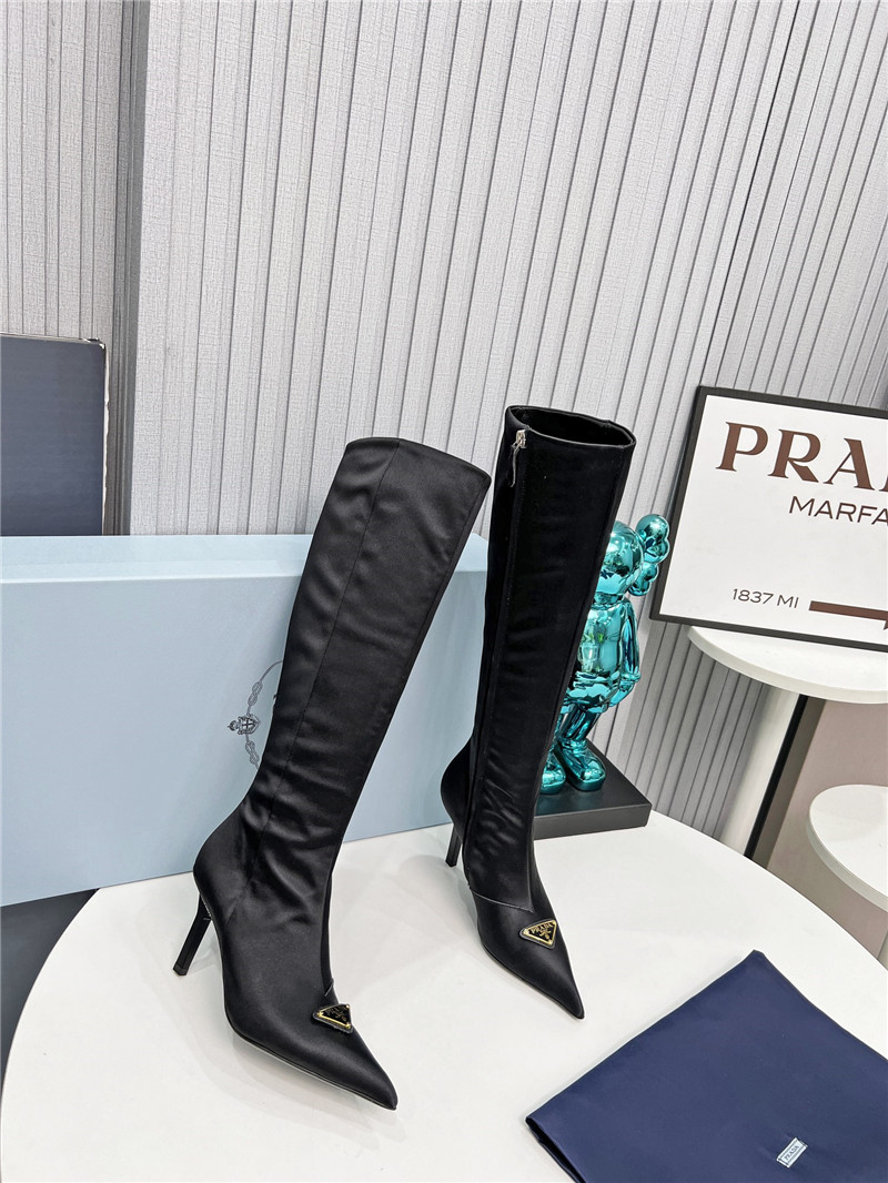 Pra*a black heel knee high boots