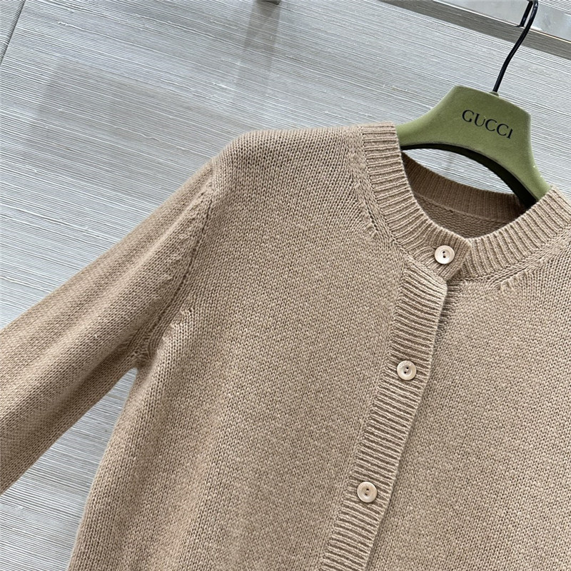 Gvc*1 beige cardigan with web finishes