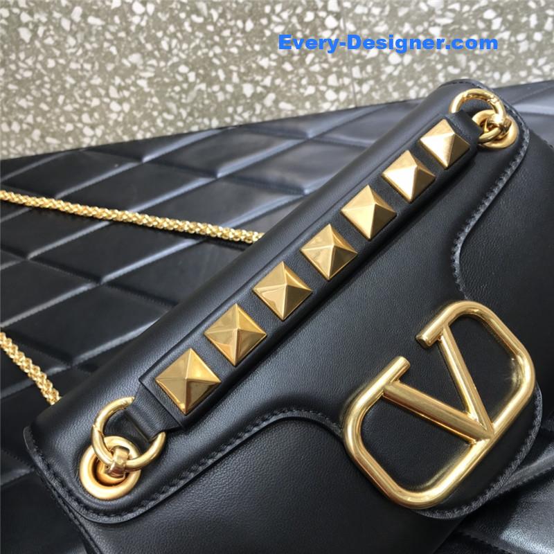 Va1e*ntin0 garavani stud sign leather shoulder bag